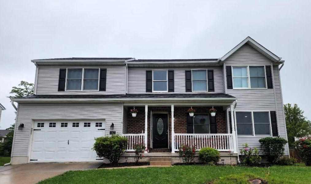 modern-two-story-house-with-garage-and-porch