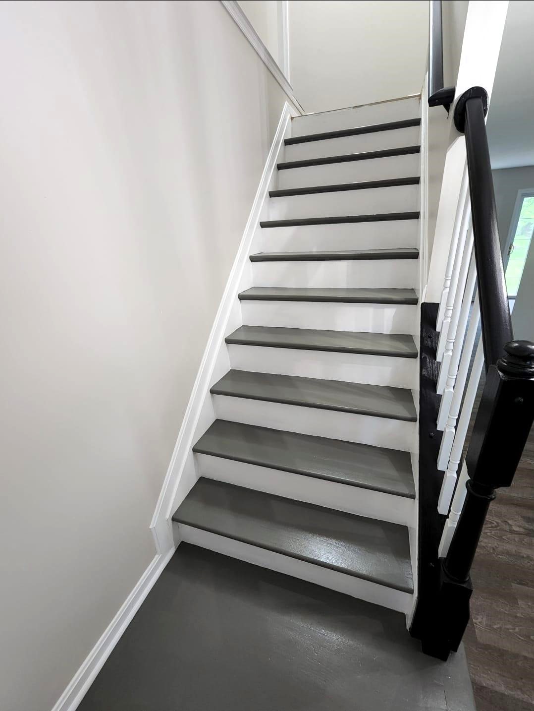 renovated-staircase-with-gray-and-white-paint