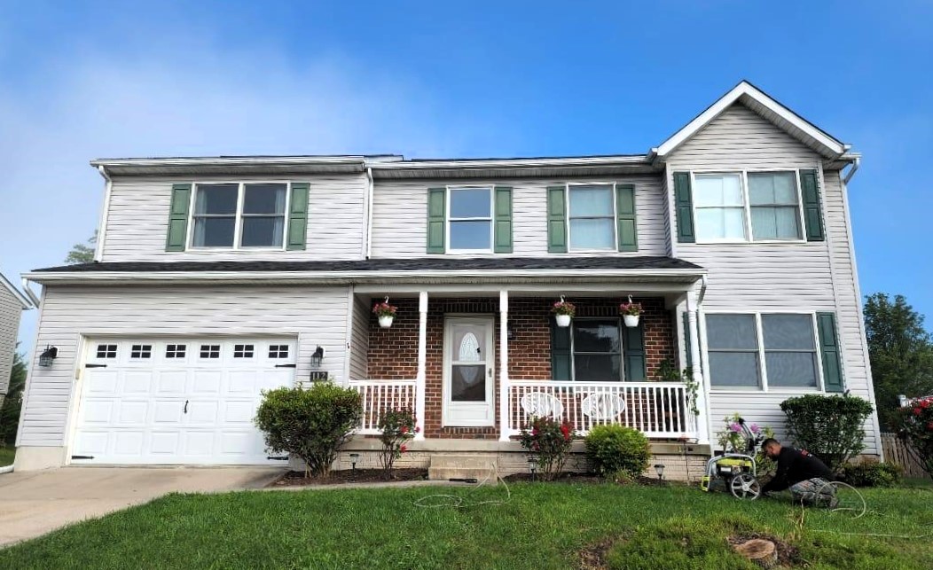 two-story-suburban-house-with-garage-and-porch